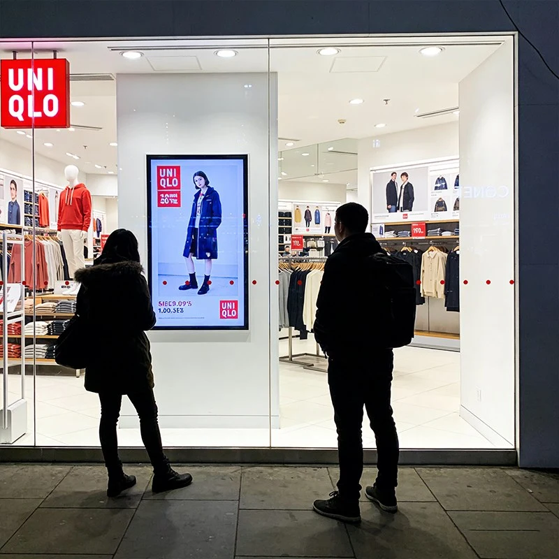 Wall digital signage for clothing retail store window fashion advertising