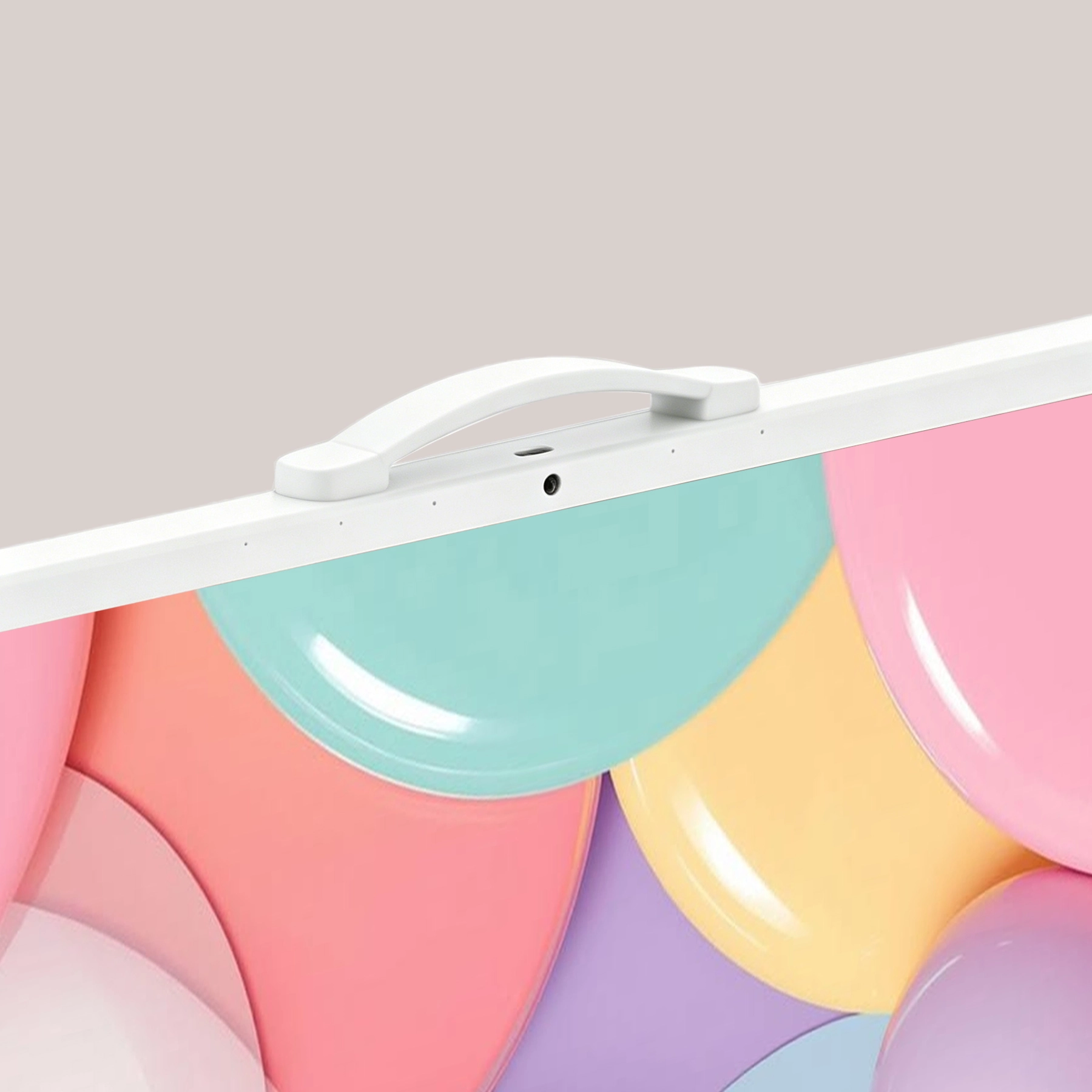 Close-up photo of the built-in, ergonomic handle on the durable briefcased smart screen, emphasizing effortless carrying.