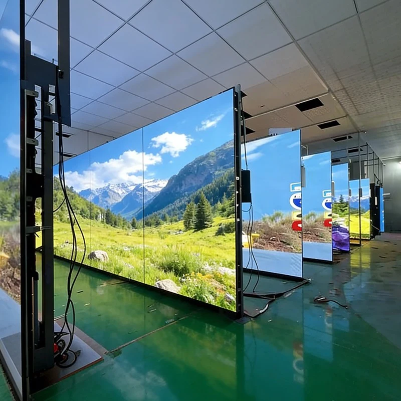 Assembled LCD video wall undergoing display testing inside production workshop