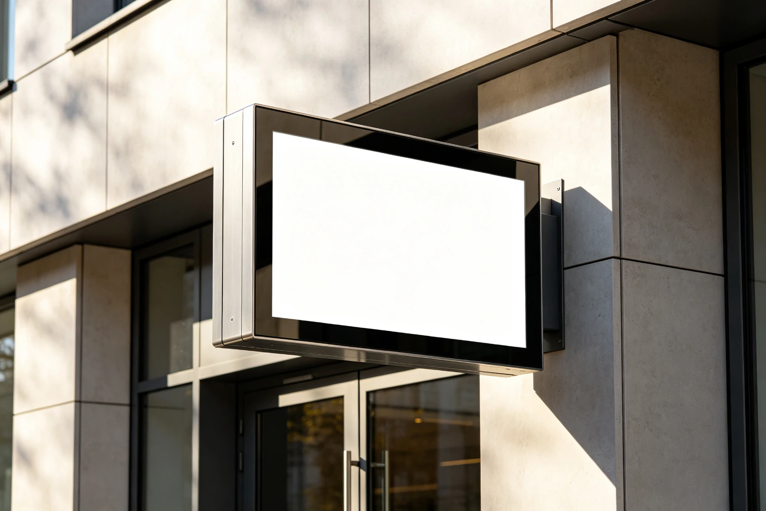 Outdoor wall-mounted digital signage display for building entrances