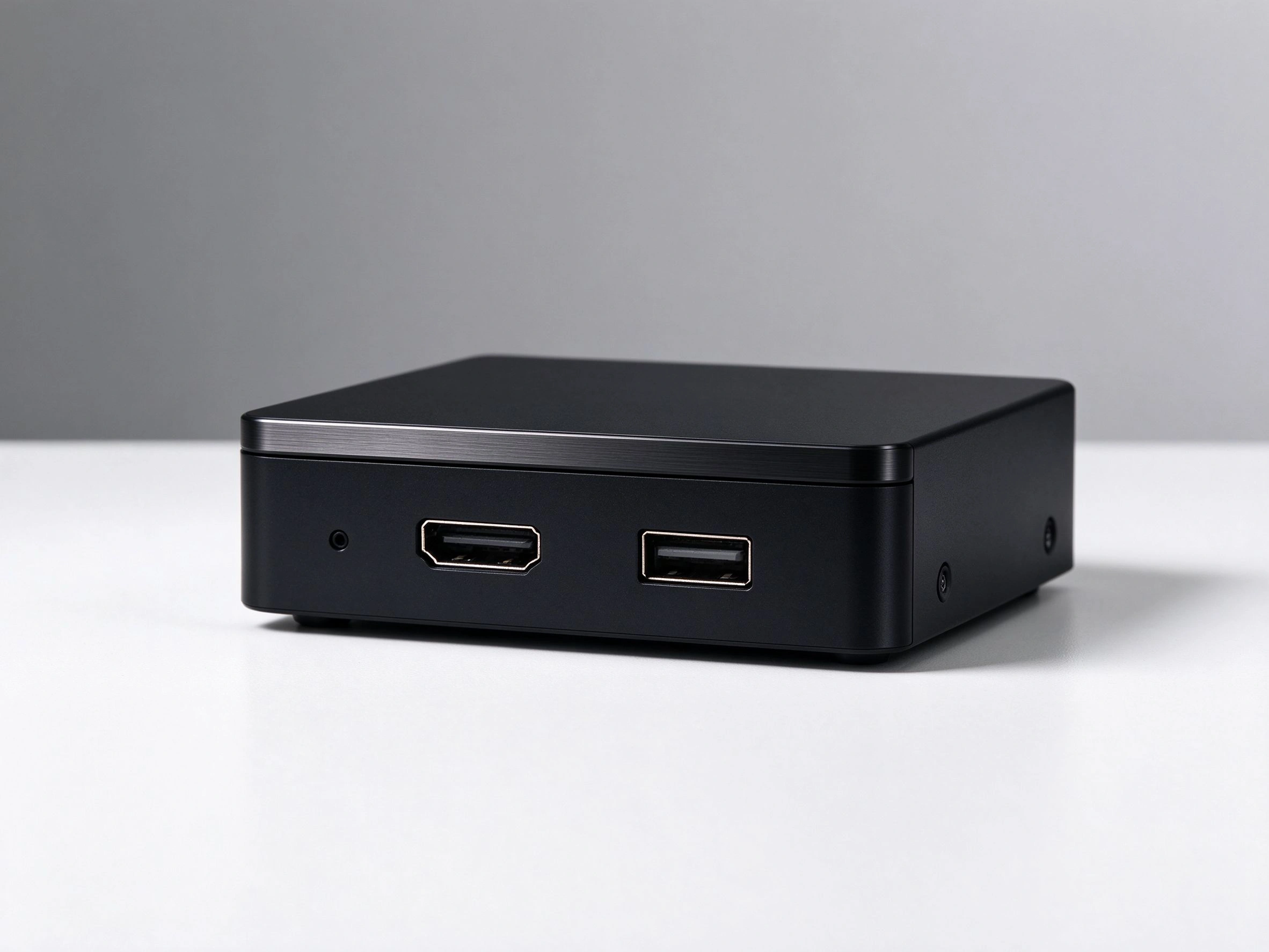 Qtenboard advertising playback box connected to retail LCD video wall for local content playback.